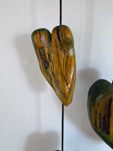 Load image into Gallery viewer, Deer antler mobile with three original painted wood hearts.