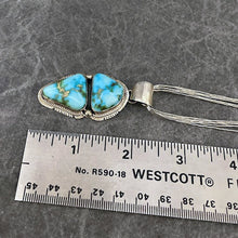 Load image into Gallery viewer, Sterling silver and Sonoran Gold turquoise pendant on six-strand silver necklace next to ruler showing size of pendant at 2"