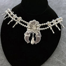 Load image into Gallery viewer, Back of Squash Blossom necklace showing signature of artist.