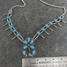 Load image into Gallery viewer, Squash Blossom necklace next to ruler showing width of nala as 1.75"