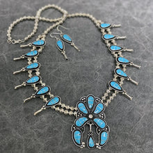 Load image into Gallery viewer, Squash Blossom necklace and earring set inlaid with turquoise.