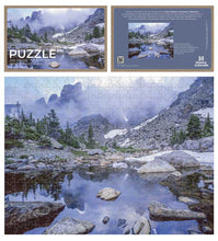 Load image into Gallery viewer, John Fielder puzzle box with picture of mountain and lake.