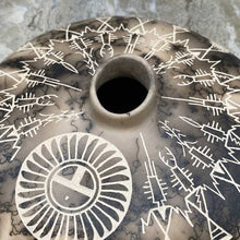 Load image into Gallery viewer, Horsehair round pot hade etched with traditional Acoma designs.