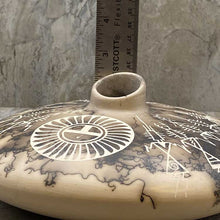 Load image into Gallery viewer, Horsehair round pot hade etched with traditional Acoma designs and ruler showing 2" height.
