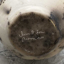 Bottom of horsehair wedding vase with artist signature.