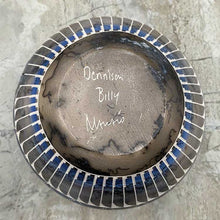 Hand etched pottery with dream catcher inlay showing bottom of pot with artist signature.