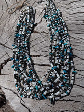 Load image into Gallery viewer, Pictured is a 10 strand beaded necklace with Kingman Turquoise nuggets and Mother of Pearl Heishi Stones.