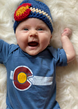 Baby with Colorado corchet beanie and Colorado flag onsie