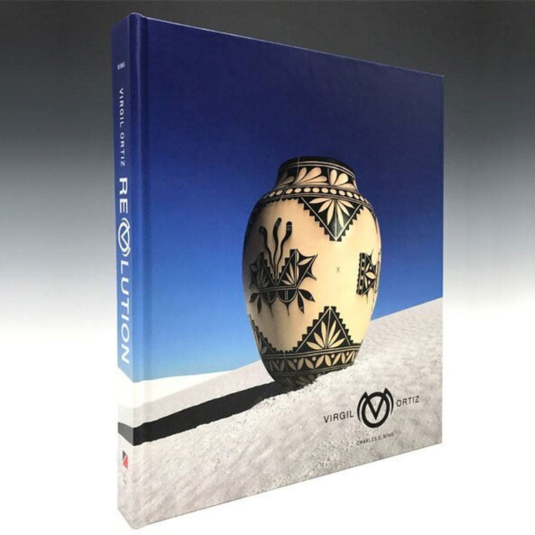 Virgil Ortiz: reVOlution book cover showing pottery on sand against cloudless sky