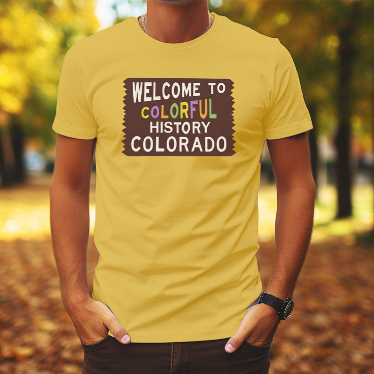 Man wearing tee shirt with Welcome to Colorful History Colorado graphic