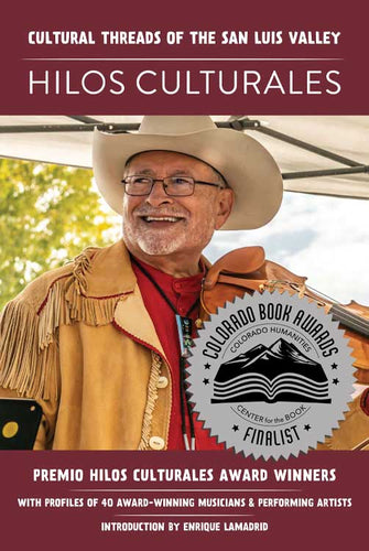 Hilos Culturales book cover with picture of smiling man wearing a cowboy hat and holding a fiddle. Colorado Book Awards sticker on front