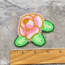Load image into Gallery viewer, Beaded broach with rose pattern next to ruler showing size of 3.5&quot;
