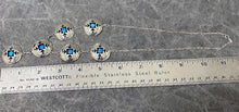 Load image into Gallery viewer, Shadowbox necklace next to ruler showing length of necklace as 11.5&quot;
