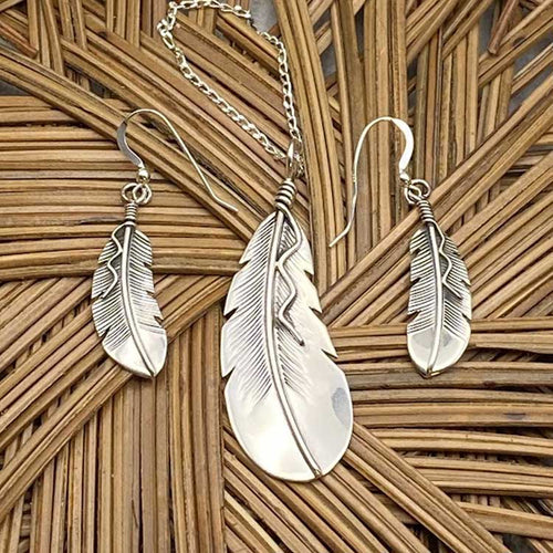 Sterling silver feather necklace and earring set.