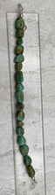 Load image into Gallery viewer, Navajo beaded turquoise bracelet with ruler showing length of 6.25&quot;.
