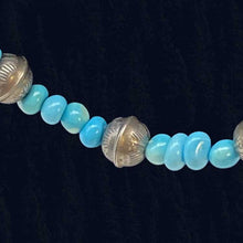 Load image into Gallery viewer, Navajo turquoise and handmade sterling silver bench bead necklace.
