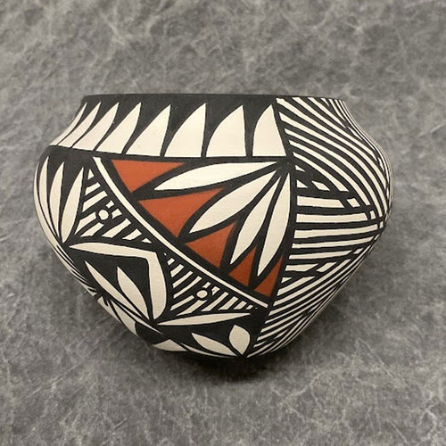 Acoma pottery with geometric designs 