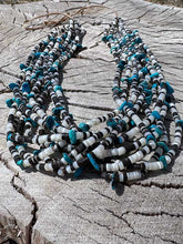 Load image into Gallery viewer, Pictured is a 10 strand beaded necklace with Kingman Turquoise nuggets and Mother of Pearl Heishi Stones.
